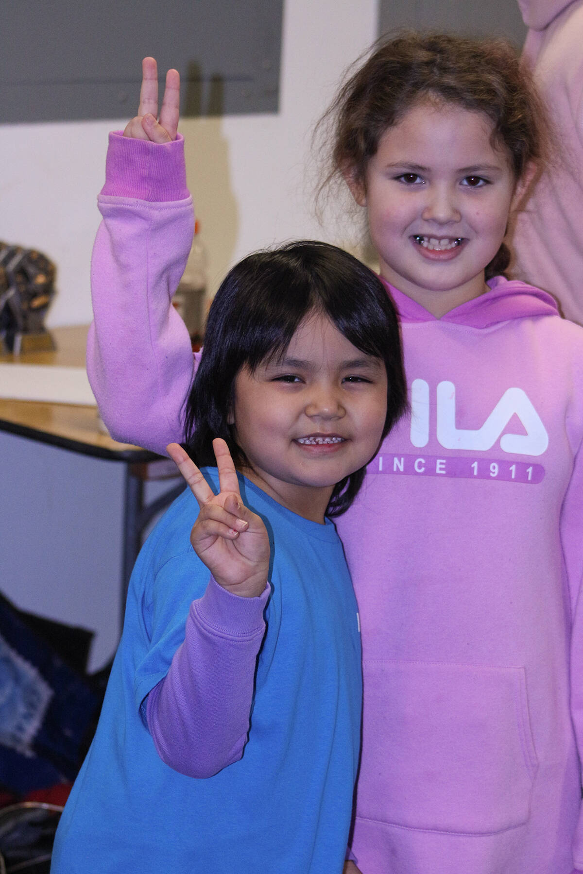 Our Youths of the Week are Amelia and Aiayah Sydney, who were taking part in the 2023 Inuvik Rock Stars introduction to curling. The pair were eager to get their photo taken. Eric Bowling/NNSL photo