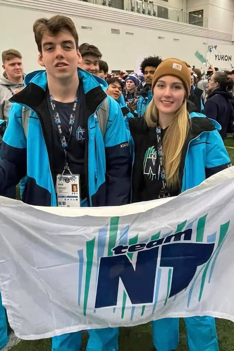 Archery is a family sport in the Groenewegen family from Hay River Julianne and her cousin Grayson are shown at the Arctic Winter Games where they competed in archery. Julianne was a silver ulu winner at the Games. Photo courtesy of the Groenewegen family