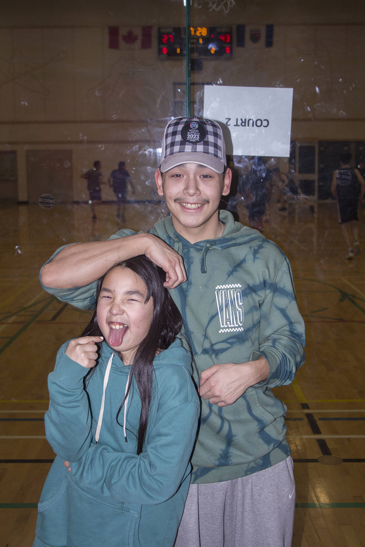 Our Youths of the Week are Chase Nogasak and Lakisha Pokiak. Chase was volunteering at the Arctic Winter Games in Fort McMurray earlier this year and Lakisha was particularly impressed with the hat he got for his efforts. Eric Bowling/NNSL photo