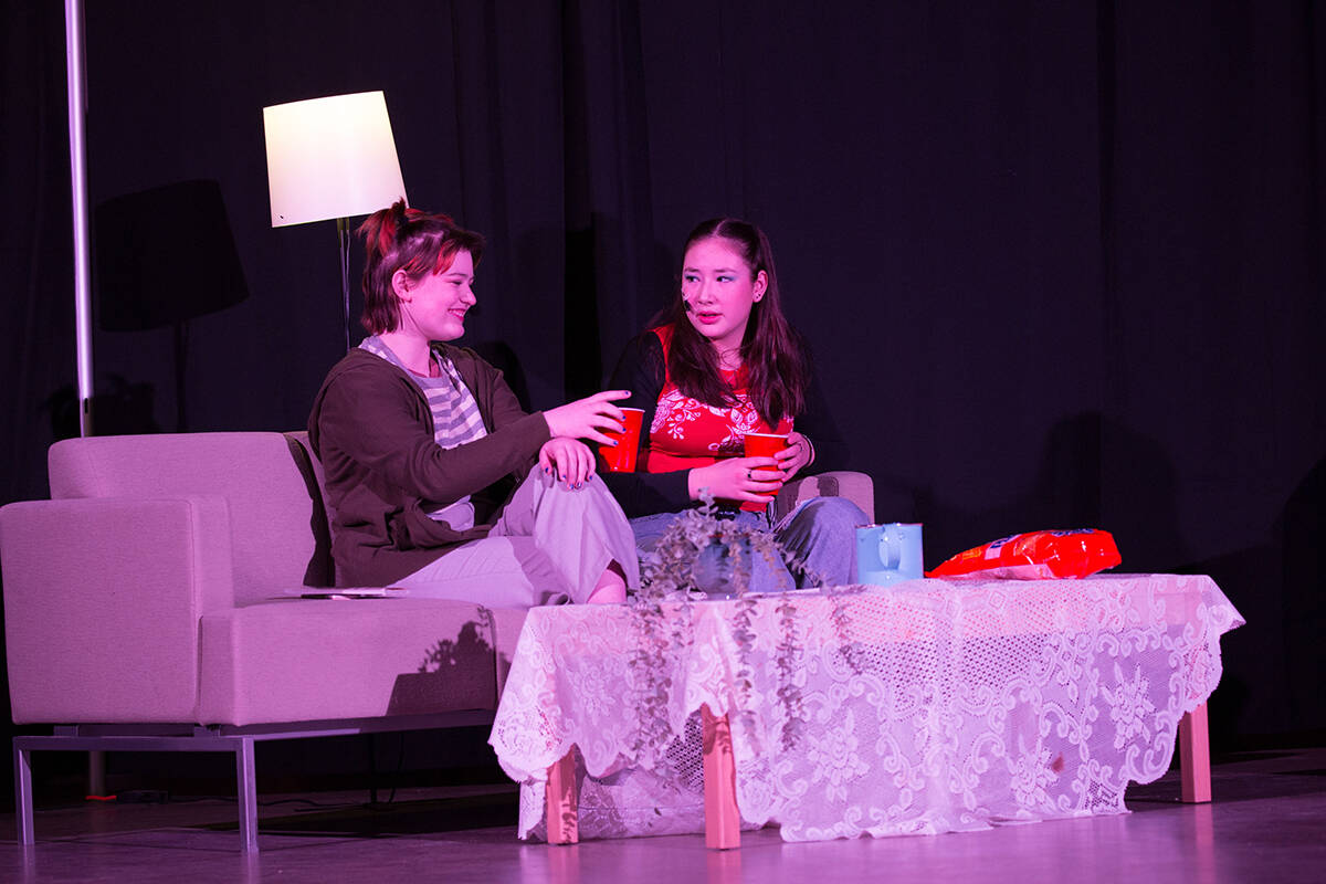 Emma (Ellie Pond) and Dawn (Emily Joe-Beaudin) have a chat about Charles Dickens Great Expectations over cheese twists and pop. Photo courtesy of Kevin Xu