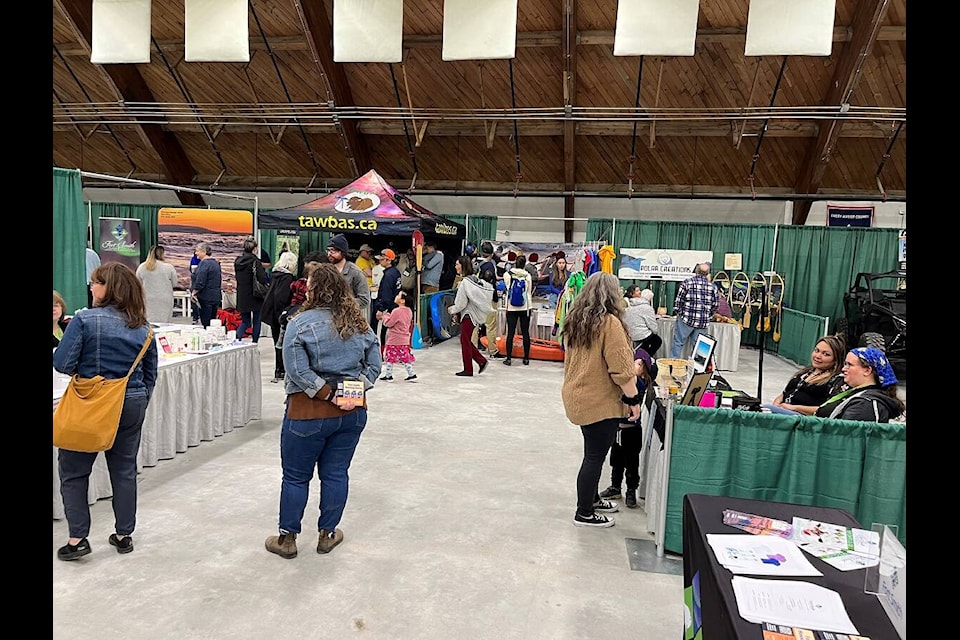 Attendees of the Thebacha Trade Show in Fort Smith mingle around the community’s Centennial Arena. Margaret McKay/NNSL photo