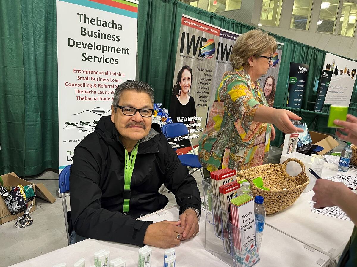 Tom Lockhart and Denise Yuhas were looking after the Thebacha Business Development Services table. Margaret McKay/NNSL photo