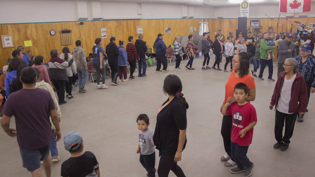 Residents of Aklavik came out for a celebratory feast to send off the racers July 19, with the Fort Good Hope Drummers giving a steady beat for a dance circle. Eric Bowling/NNSL photo