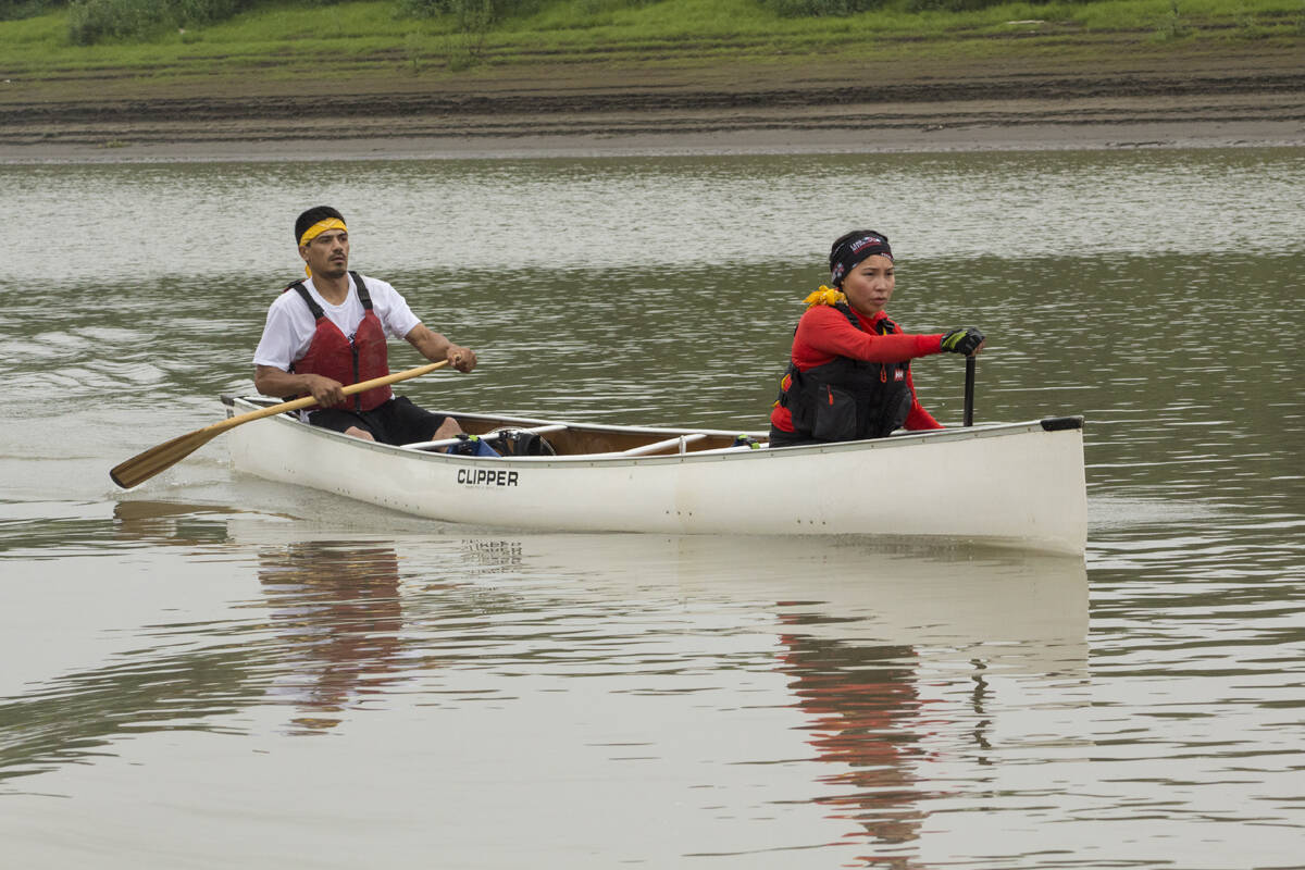 Shaun Tobac and Cara Manuel eye what awaits them down river. Eric Bowling/NNSL photo