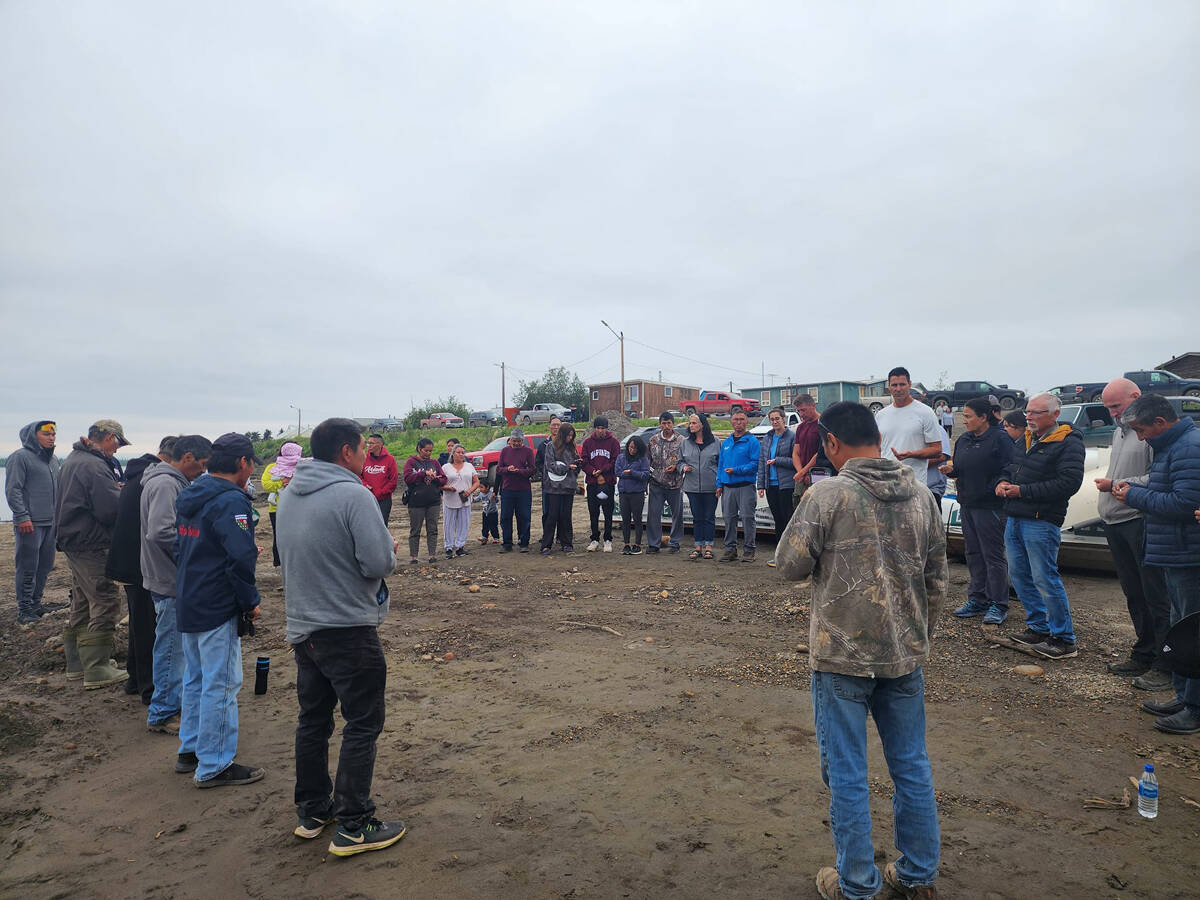 Participants bless the river the night before the race begins. Photo courtesy of Donovan Arey