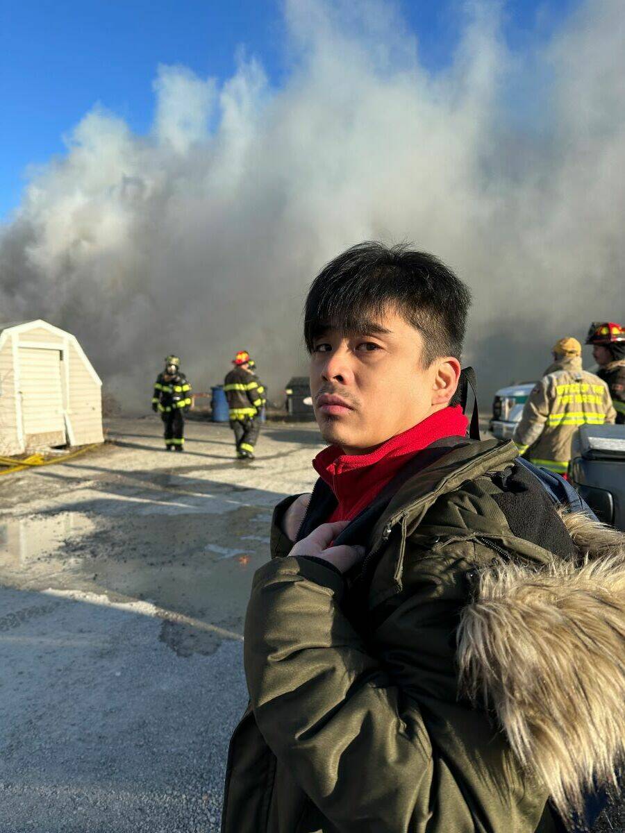 Adrian Ayson, a resident of the apartment building, said he was at work when he heard Garden Townhomes caught fire, so he came home immediately. His uncle and other relatives were inside and fled without injury. Kaicheng Xin/NNSL photo