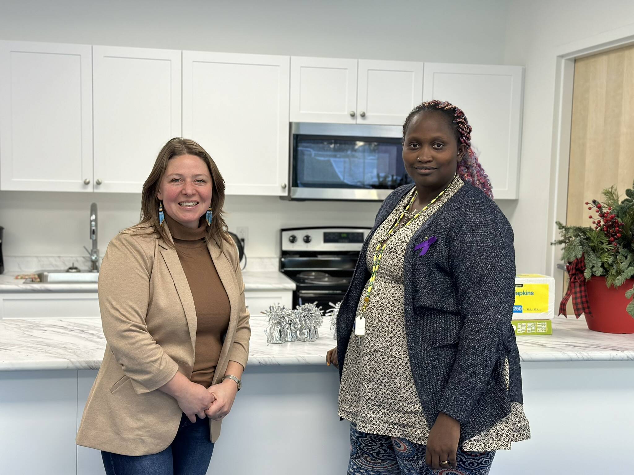 Alayna Ward, director of community relations for YWCA NWT, and Hawa Dumbuya-Sesay, the organizations executive director, were excited to announce the opening of the YWCAs 21-unit apartment building on Tuesday. Kaicheng Xin/ϳԹ photo