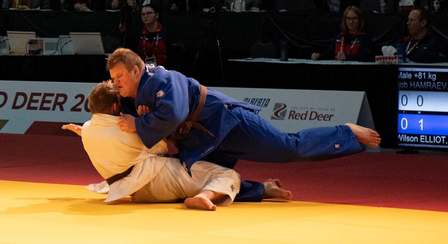 Wilson Elliot, in blue, gets the upper hand on Ijob Hamraev of Manitoba during the bronze medal match in the boys 81-kg judo competition at the Canada Winter Games in Red Deer, Alta., on Wednesday. Sarah Pruys/Team NT photo
