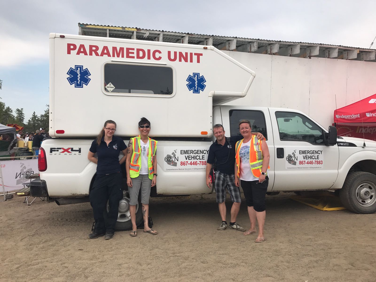 Matt Vincent often donates supplies, medics and vehicles to various events around Yellowknife, as seen here at Folk on the Rocks 2018. From the left, Geraldine Maloney (EMT) Betty Anne Nickerson (EMR) Matt Vincent (Ceo/EMT-P) Carolyn Ridgley (RN BN). Courtesy of Matt Vincent