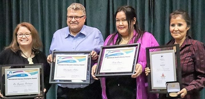 Dr. Suzanne Robinson, left, is joined by fellow award winners Christopher Aitken, Carly Sayers and Diane Brule at the annual adult learners' luncheon last week. Dylan Short/NNSL photo.