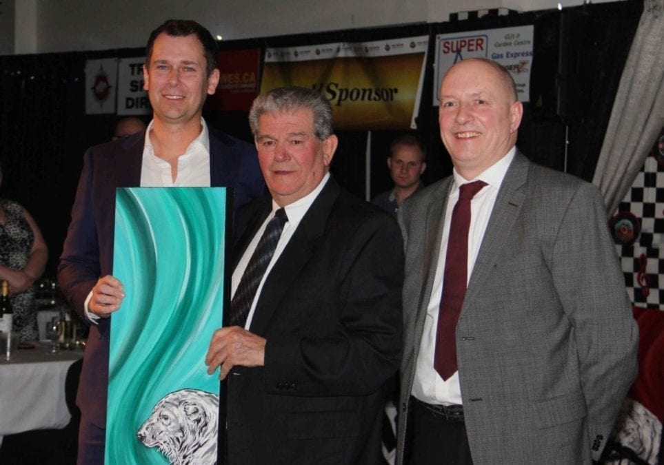 Former MLA and volunteer extraordinaire Paul Delorey, centre, was honoured as Hay River's Citizen of the Year on March 2. The award was presented by Glenn Smith, left, the assistant senior administrative officer with the Town of Hay River, and Coun. Steve Anderson. Paul Bickford/NNSL photo