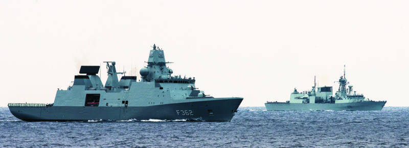 Danish HDMS PETER WILLEMOES, left, and Her Majesty's Canadian Ship WINNIPEG, right, sail during Exercise JOINTEX 15 as part of Trident Juncture 15 on October 24, 2015. Photo courtesy of LS Peter Frew, Formation Imaging Services Halifax HS2015-0838-L034-001
