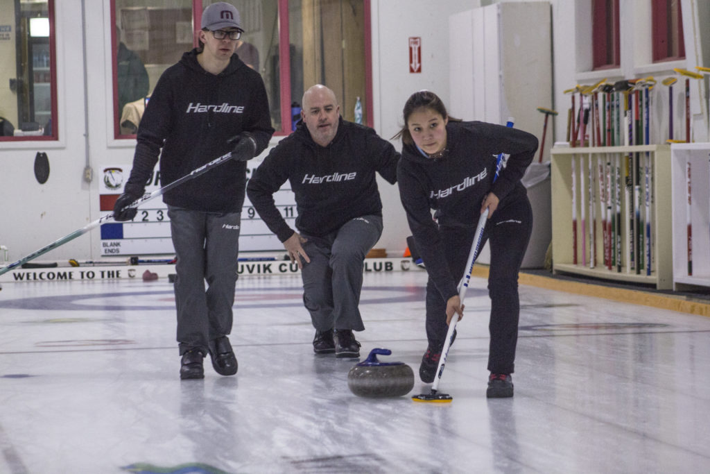 Chasity O'Keefe and Cole Parsons follow a rock thrown by Jamie Koe during the final round of the NWT Mixed Curling Championship at the Inuvik Curling Centre March 6. Team Koe held on to a lead to win the championship.