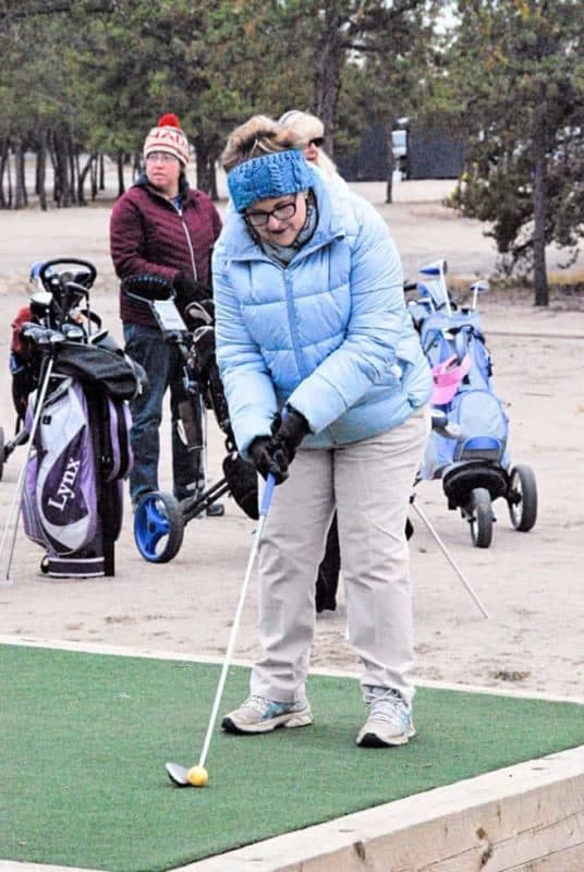 Jeanette King sets up for her tee shot on the 10 th tee during the final Ladies Night of the season at the Yellowknife Golf Club on Wednesday. James McCarthy/NNSL photo 