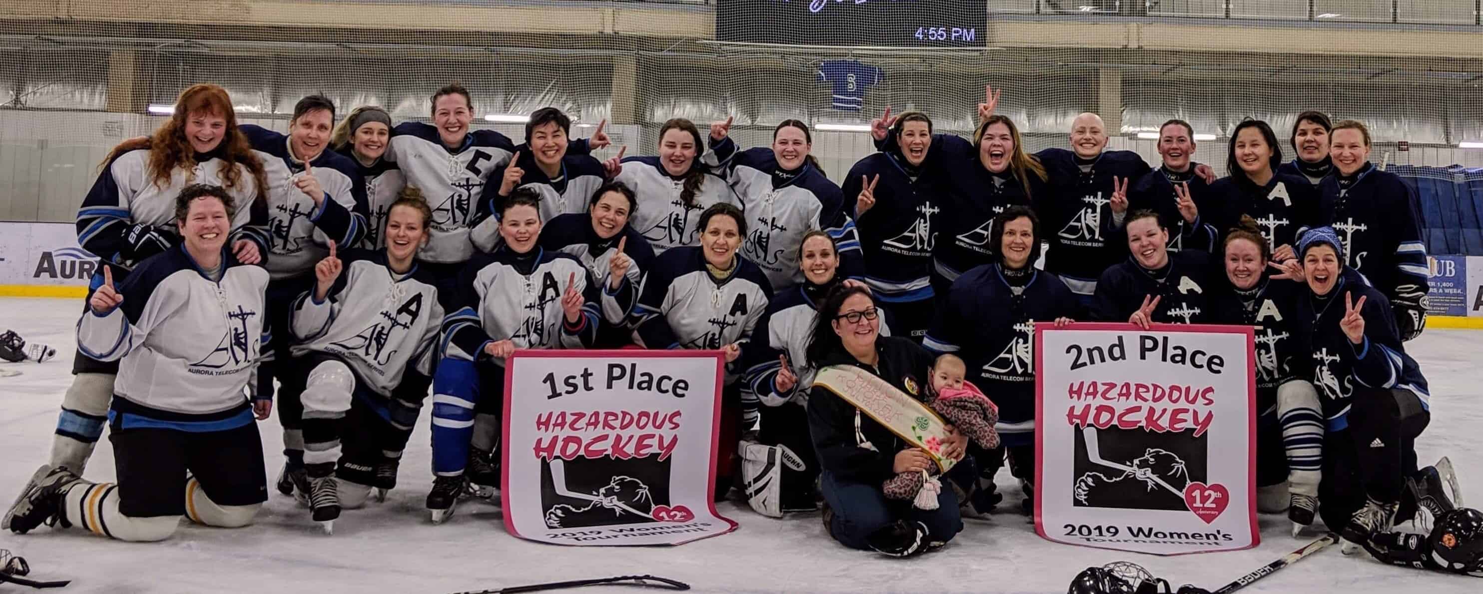 The Yk Women's Hockey League snagged the top two spots at the Hazardous Women's Hockey Tournament in Hay River this past weekend with Yk White beating Yk Blue in the final. They are, in front, Aurora and Peyton Kotokak; middle row from left, Maureen Hans, Jenna Blanchard, Jennifer Ryden, Melanie Parker, Allison Kincaid, Kate Gamble, Karen Brown, Tehnille Gard, Jeanne Yurris and Janna Graham; back row from left, Kim Bergman, Martha Goodman, Alison Harrower, Chloe Dragon-Smith, Donna Bee, Caitlyn Thompson, Contessa Stead, Heather Cane, Heather Atkins-Desjarlais, Jill Alain, Liz King, Nicole Henkel, Laura Krutko and Tracy Mifflin. Missing from photo is Keri-Ann Loutit. photo courtesy of Jen Ryden