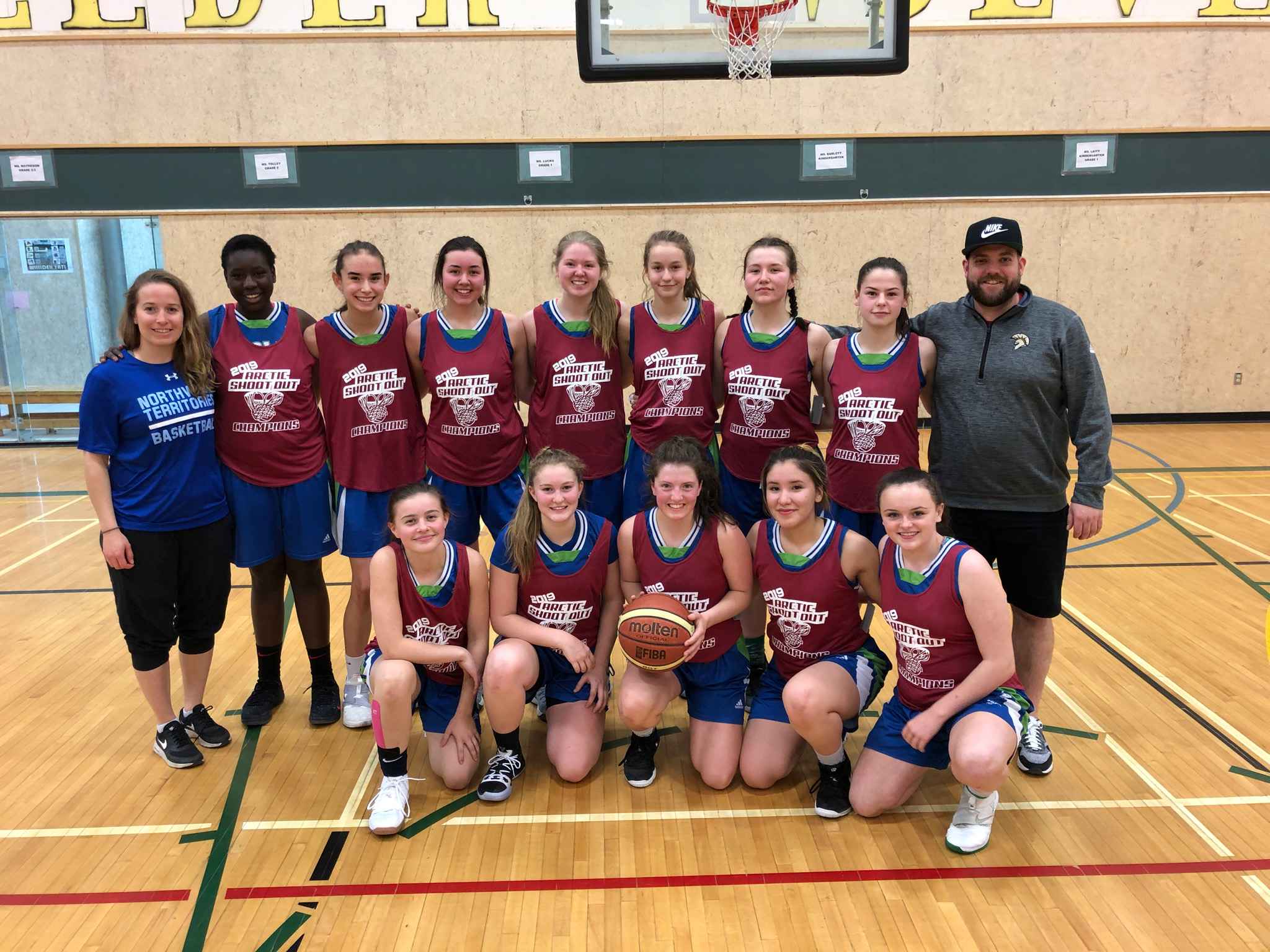 The Deton Cho Eagles are your women's Arctic Shoot-Out champions after beating the Funky Bunch in the final on Sunday at Weledeh Gymnasium. They are, front row from left, Lily Newberry, Mali Straker, Mia MacInnis, Naomi Yukon and Kaitlyn Kenny; back row from left, assistant coach Claire Mennell, Jordan Muchenje, Elle Mitchener, Meadow Munroe, Emma Willoughby, Taya Straker, Lili Casaway, Drew Wolfe and head coach Aaron Wells. photo courtesy of Cole Marshall