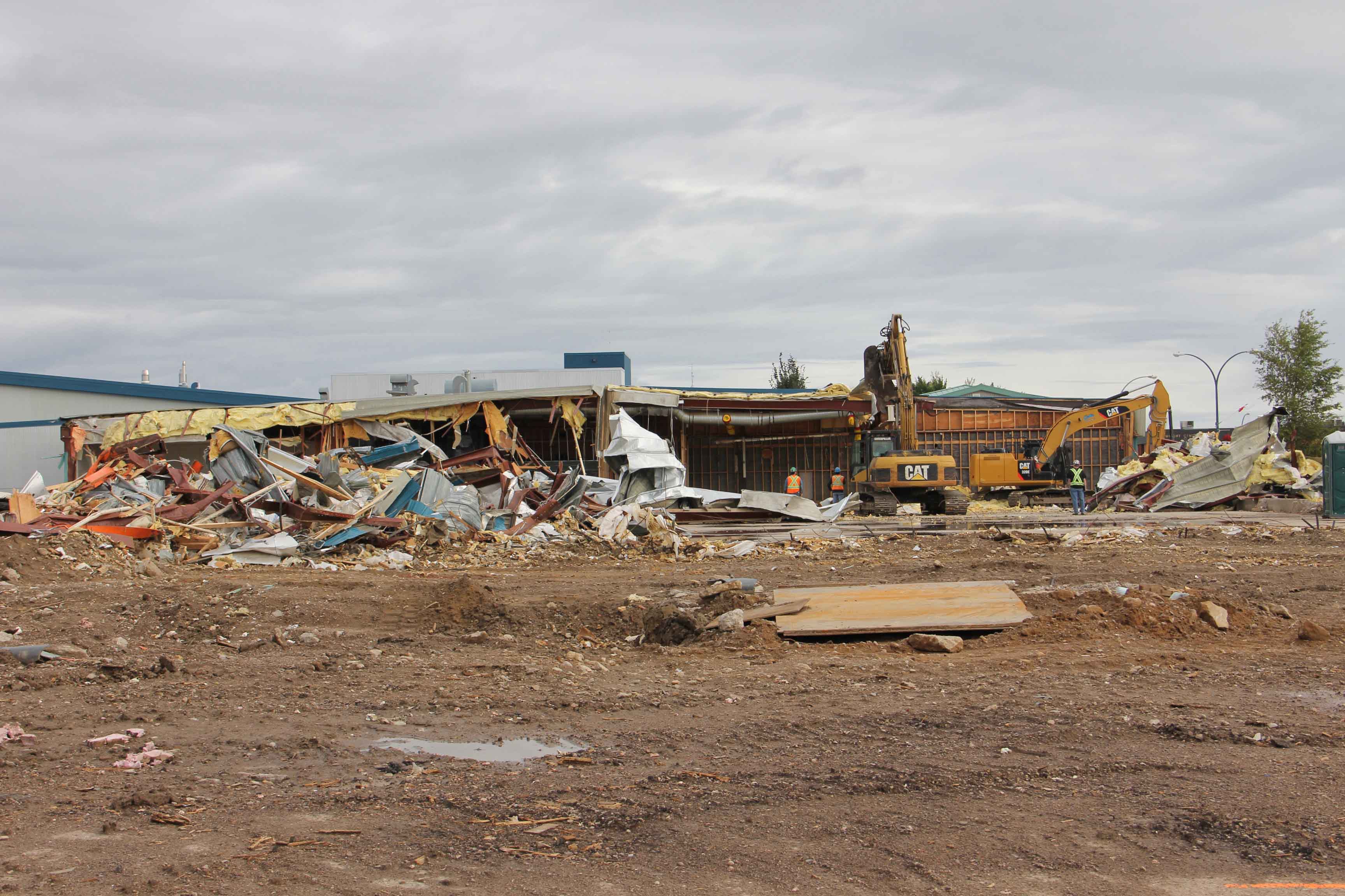 Decades from now, this scene from 2016 - the demolition of the old Rec Centre - may repeat itself in Hay River, and town council is planning ahead to pay for replacing the still-new Rec Centre. NNSL file photo
