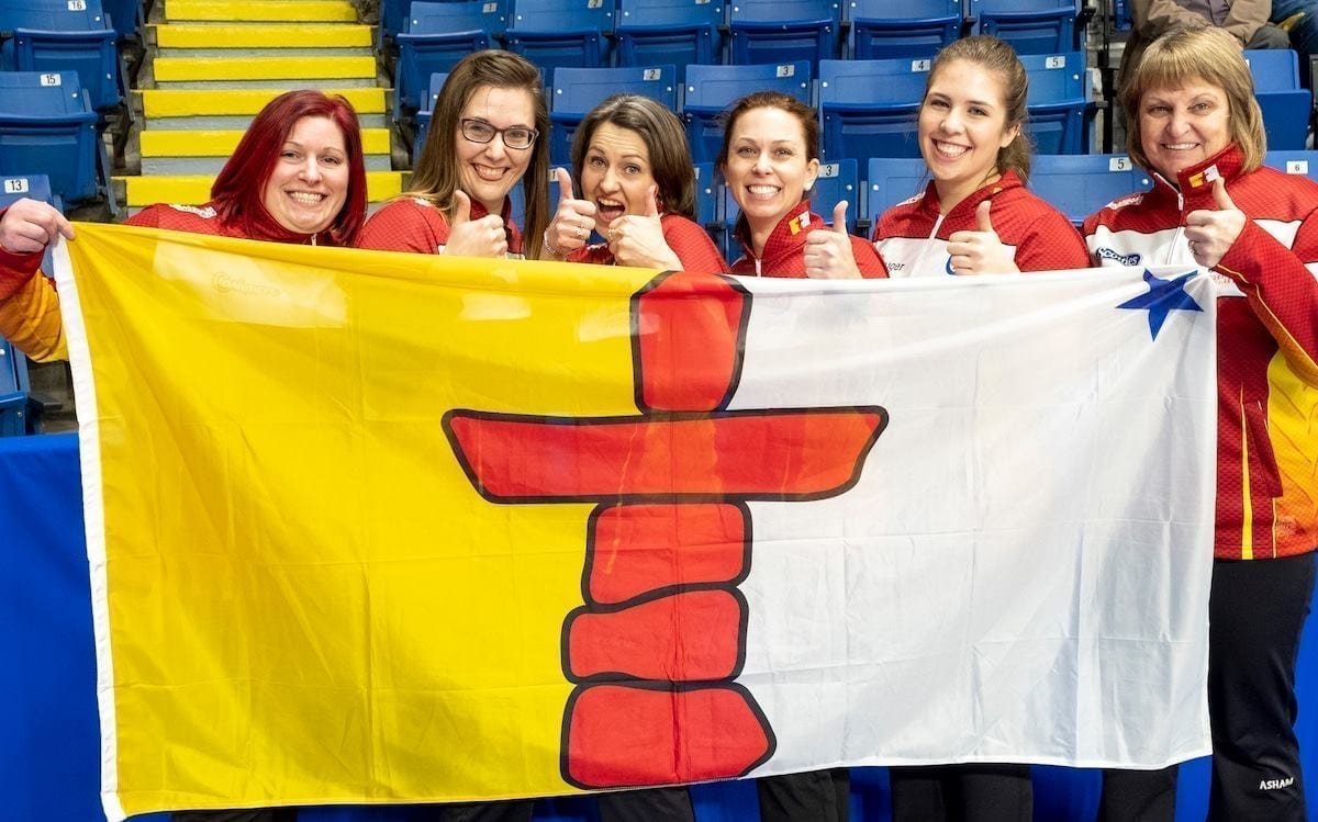 Nunavut finally hit the win column officially at the Scotties Tournament of Hearts in Sydney, N.S., as the rink from the Iqaluit Curling Club defeated Quebec on Saturday by a score of 4-3. The smiling ladies are, from left, Megan Ingram, Jenine Bodner, Jennifer Blaney, Alison Griffin, Sadie Pinksen and coach Susanne Martin. photo courtesy of Curling Canada