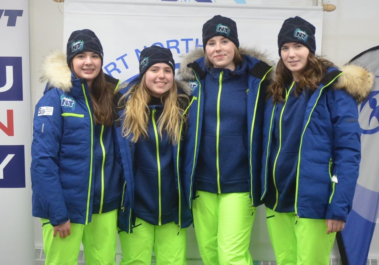 Team NT's Arctic Winter Games figure skating team of Brooke Vallis, left, Sarah Campbell, Emily Hazenberg and Victoria Hamm model off the official walk-out uniform that the team will wear during the opening ceremony in Whitehorse when the Games begin on March 15. The uniform was officially unveiled at the Sport North office in Yellowknife on Feb. 13. James McCarthy/NNSL photo