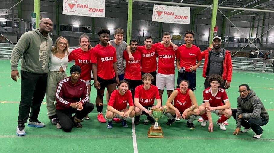 Yk Galaxy Pepsi are your winter indoor champions of the Yk Adult Soccer League after winning the title at the Fieldhouse on March 11. They are, front row from left, Mimi Mbimbo, Tanisha Steinwand, Trey Granter, Chelsea Dubiel, Michael Sadler and Yowhans Gebreluol; back row from left, assistant coach Wonder Ndhlovu, Ruzanna Smbatyan, Alexie Morin-Holland, Solii Dzemua, Phil Breton, Agnel Poruthur, Arman Aslanyan, Mohammed Ait Ahmed, Gabe Mahamad and Shadaine Shirley. photo courtesy of Yk Adult Soccer League 