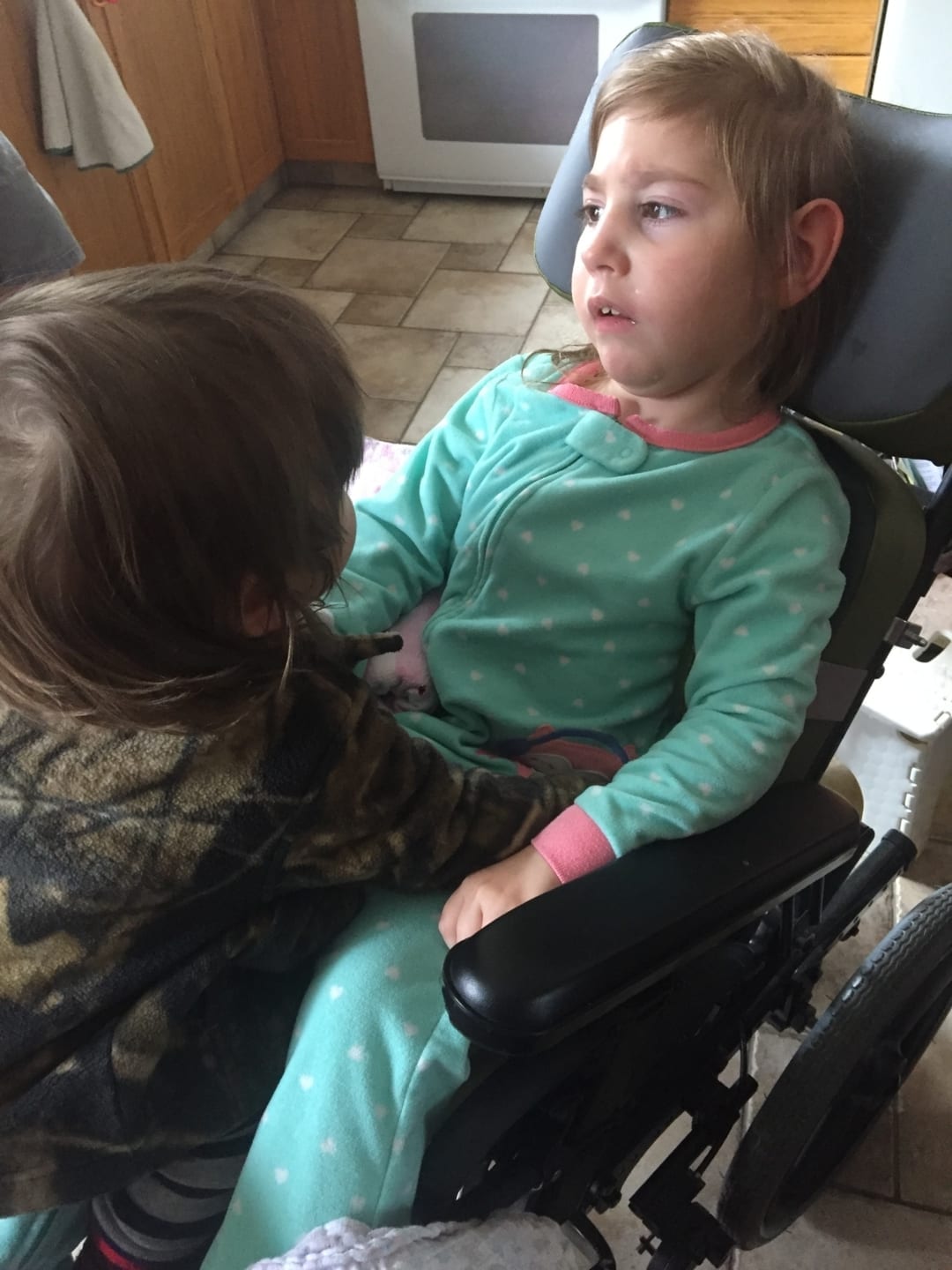 Mikaela MacNaughton had severe strokes at birth which has left her with quadriplegic cerebral palsy, blindness, seizures and multiple other ailments. Her stiff legs have caused her hip to dislocate which means she will need specialized surgery in Texas. Courtesy of Ruth MacNaughton