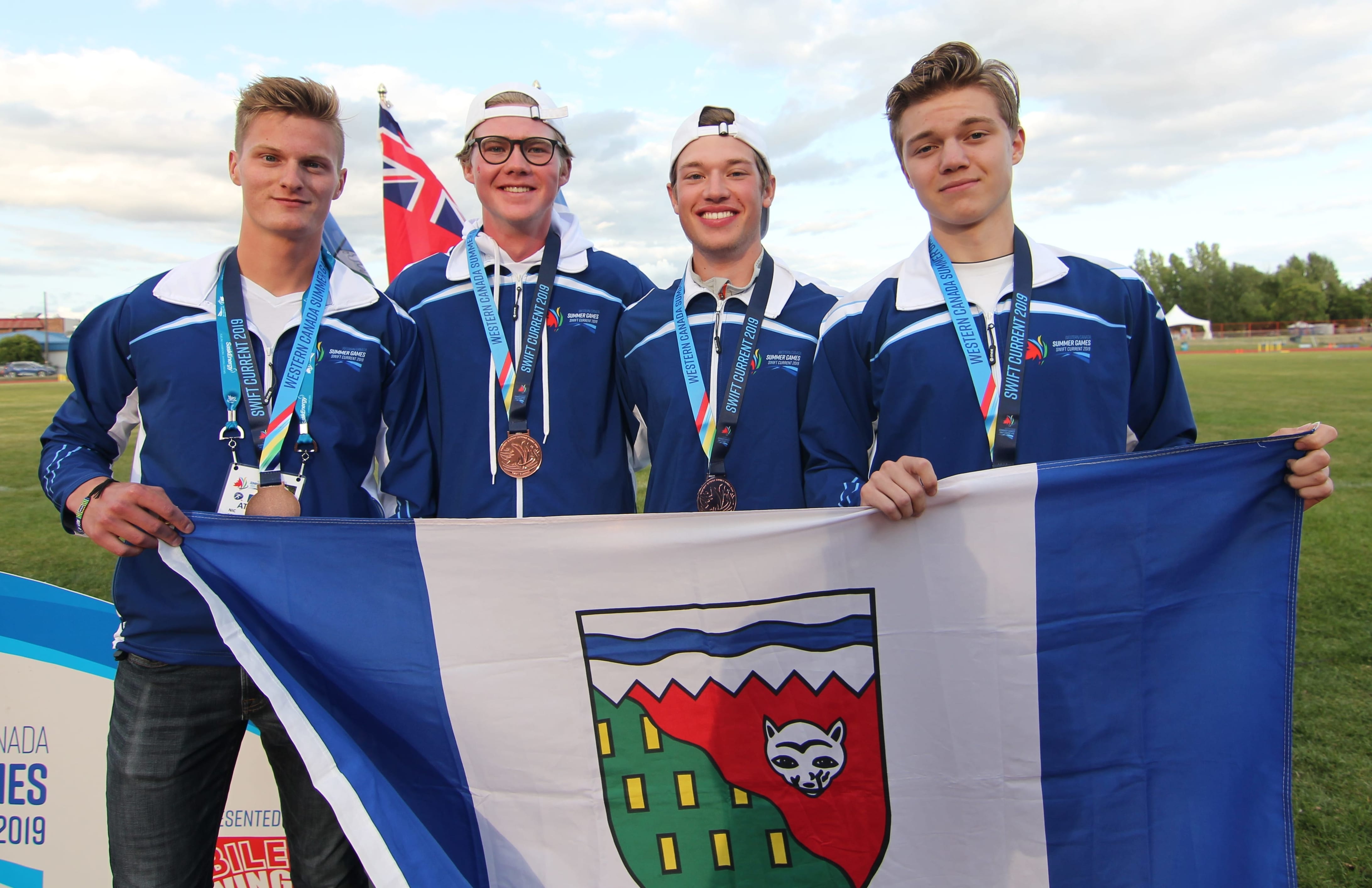 Nicolas Bennett of Yellowknife, left, Zachary Horton of Hay River, Bryce Smith of Hay River and Stryden Hult-Griffin of Inuvik captured a bronze medal for Team NT in the boys medley relay in track and field at the Western Canada Summer Games in Swift Current, Alta., on Saturday. photo courtesy of Rob Hart