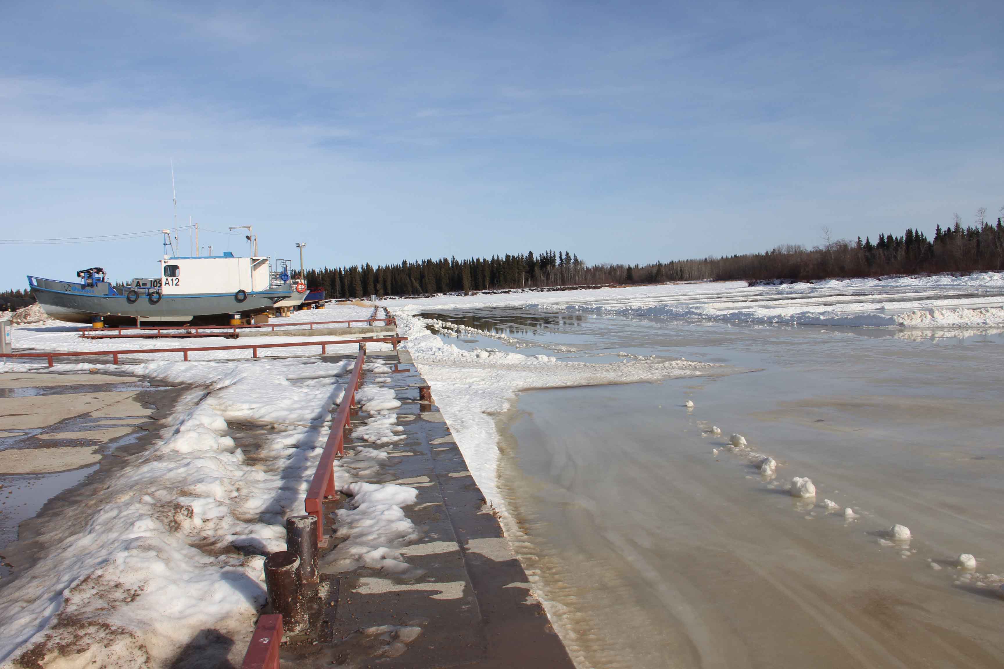 By March 18 - when the temperature hit 13 degrees - the ice on the Hay River in front of Fisherman's Wharf was obviously in no condition for pond hockey. Paul Bickford/NNSL photo