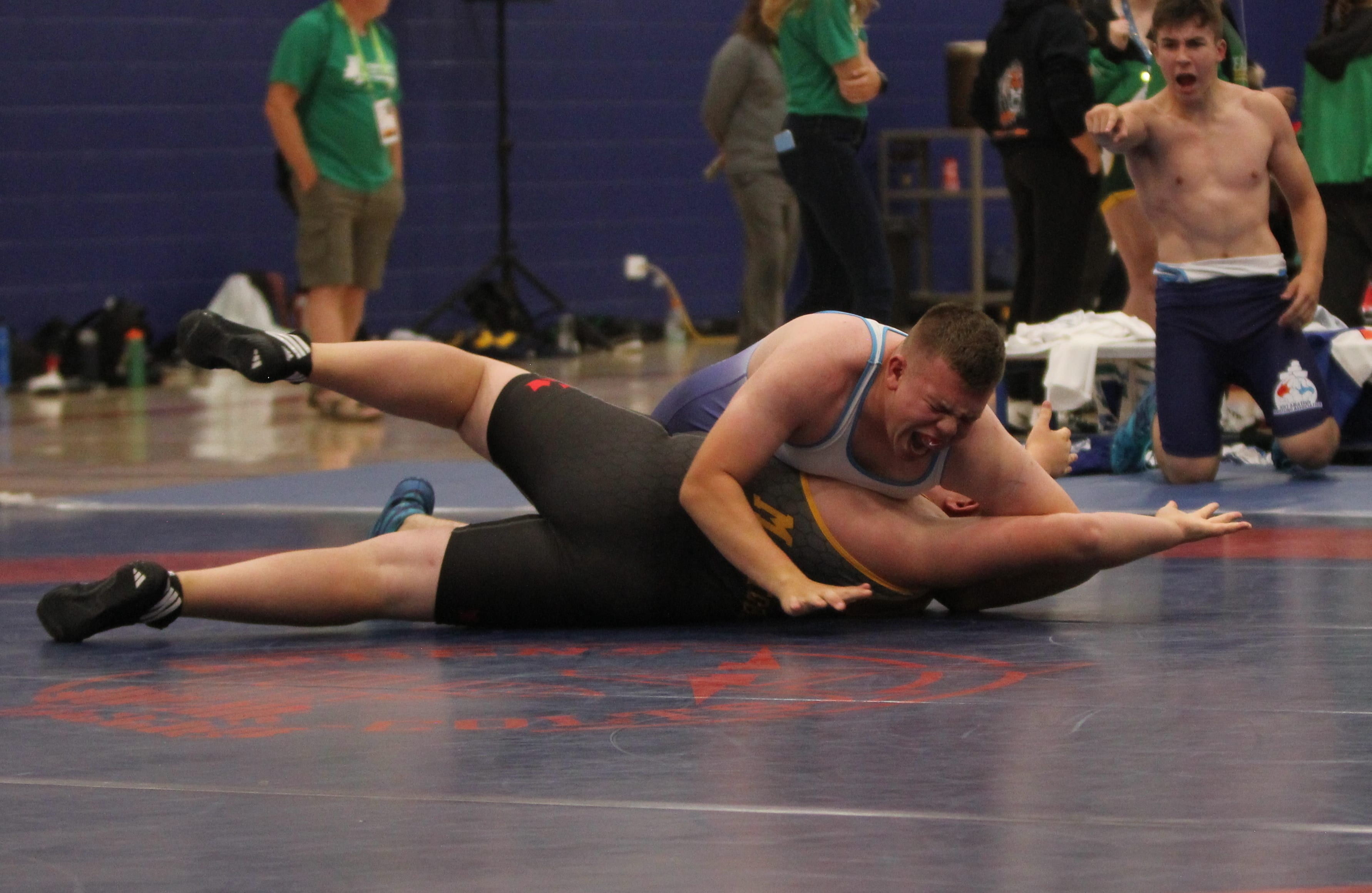 Cameron Courtoreille rolls over Tom Haight of Manitoba for the pin during their match at the Western Canada Summer Games in Swift Current, Sask., on Aug. 16. Courtoreille captured bronze on Sunday by beating Haight for a second time by pinfall. photo courtesy of Rob Hart