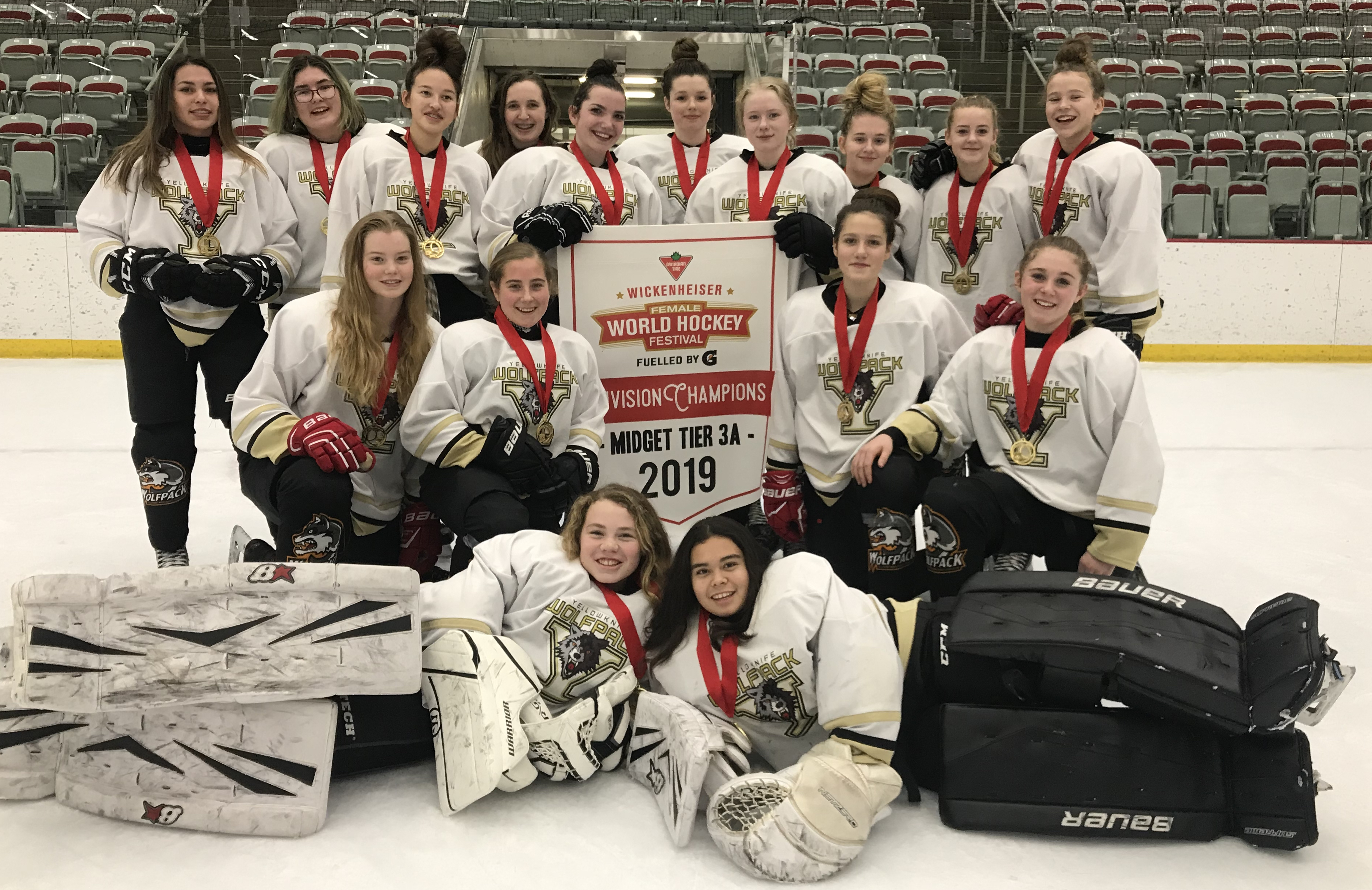 The Yellowknife Wolfpack senior girls outfit won gold in the midget Tier 3 division at the Wickenheiser Female World Hockey Festival in Calgary on Nov. 17. They are, front row from left, Ellie Loutitt and Kamilah Gostick; middle row from left, Anais Aubrey-Smith, Helen McKay-Ivanko, Jenna Demarcke and Jaci Dusome; back row from left, Zoey Remo, Samantha Noyce, Julia Heron, Brooklyn Helyar, Katie Hart, Maddie Minkoff, Taylor Catcher, Emma Wicks, Emma Carey and Sarah Porter. photo courtesy of Rob Hart