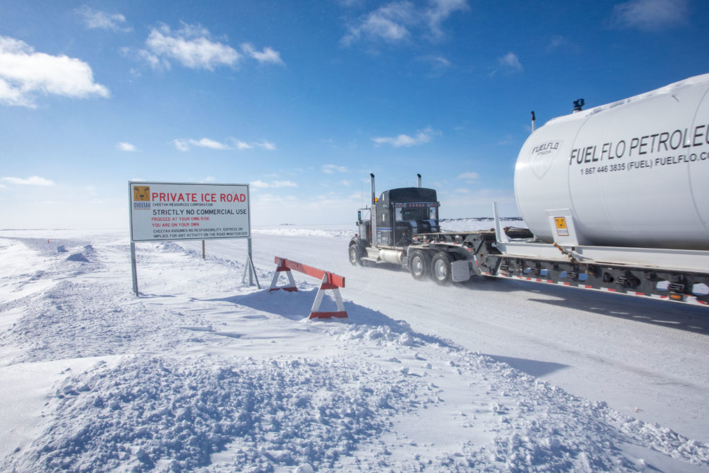 A truck transports a 100,000-litre fuel tank to the Nechalacho rare earth project site on the new, 110-km ice road from Dettah, on Saturday. Bill Braden photo courtesy of Cheetah Resources Corp.