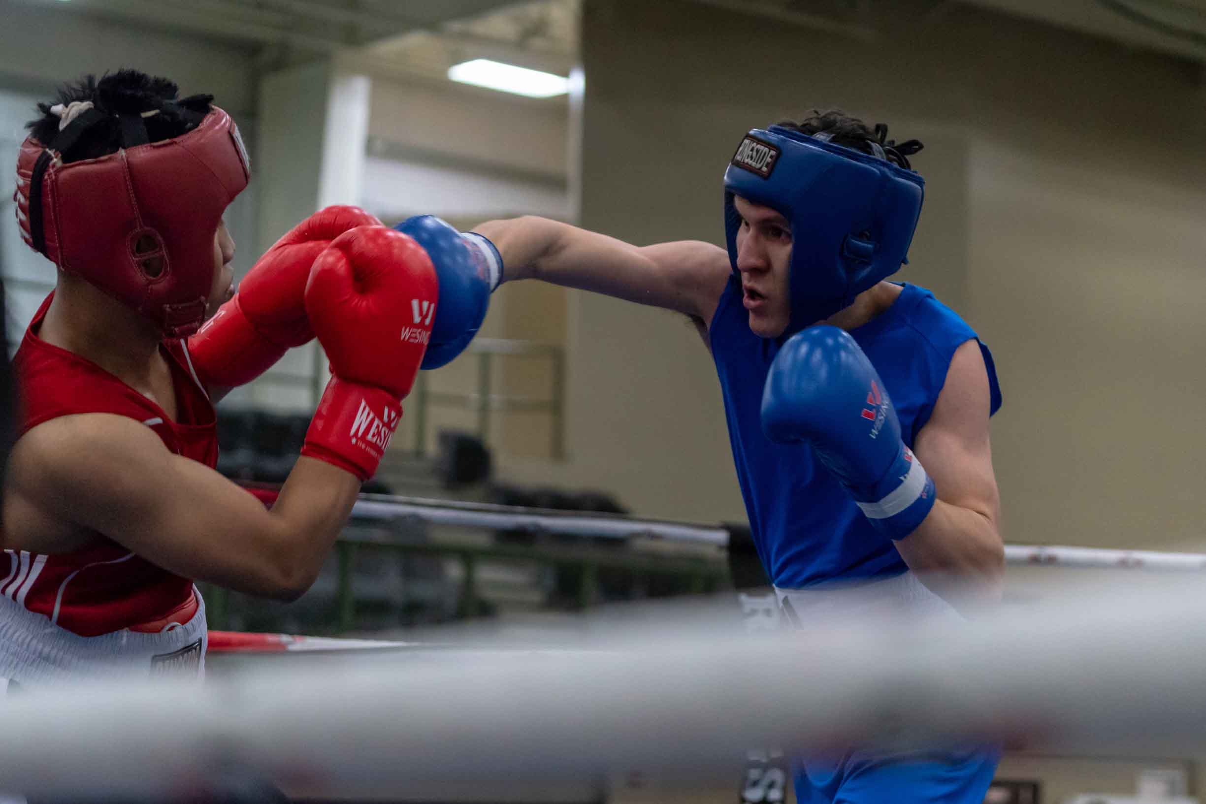Hay River's Jesse Mackie, right, is an amateur boxer now living in Grande Prairie, Alta. In March, he won his only bout at the Alberta Provincial Boxing Championships in Leduc. His opponent was Jerico Aringo of Slave Lake. Photo by Dean Rumpel