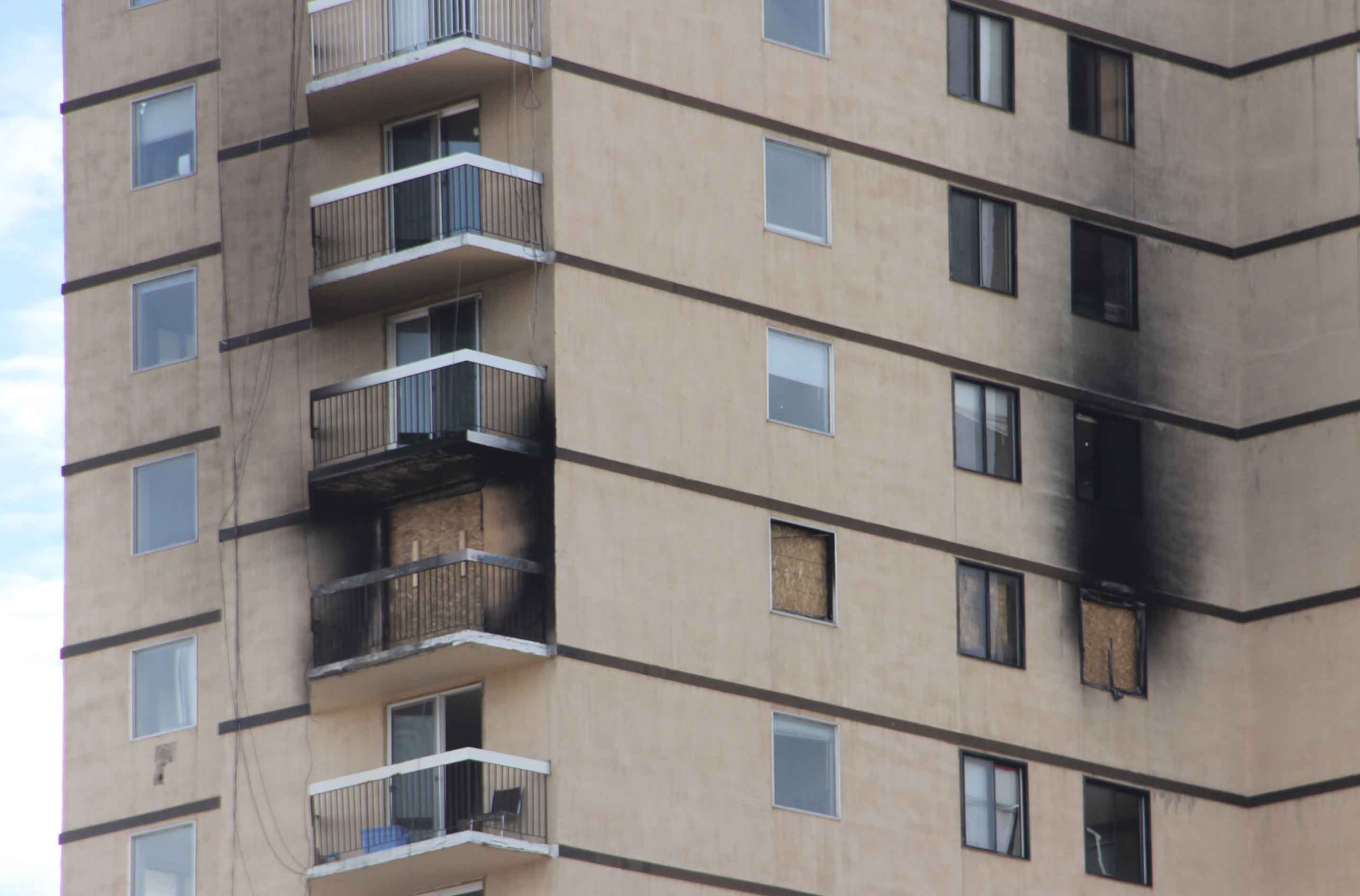 The damage to the Mackenzie Place highrise from a March 15 fire on the 11th floor is apparent from the outside of the building. Paul Bickford/NNSL photo