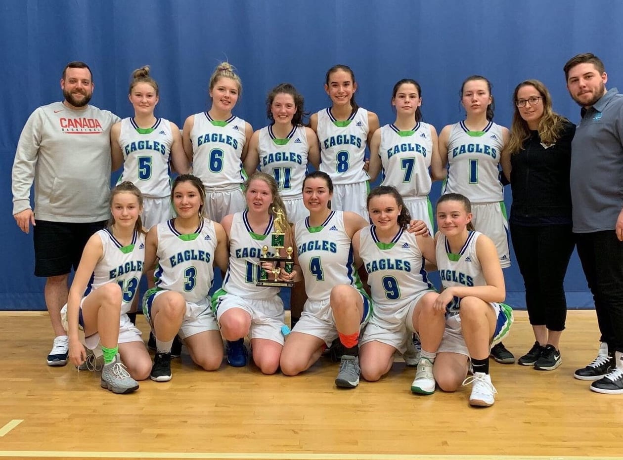 The Deton Cho Eagles girls high performance basketball squad wrapped up its club season this past Sunday by finishing second in the U17 silver division at the Volvo 120 Hoops Showcase in Edmonton. They are, front row from left, Taya Straker, Naomi Yukon, Emma Willoughby, Meadow Munroe, Kaitlyn Kenny and Lilly Newberry; back row from left, head coach Aaron Wells, Mali Straker, Denae Lafferty, Mia MacInnis, Elle Mitchener, Drew Wolfe, Lili Casaway, assistant coach Claire Mennell and assistant coach Scott Green. photo courtesy of Benji Straker