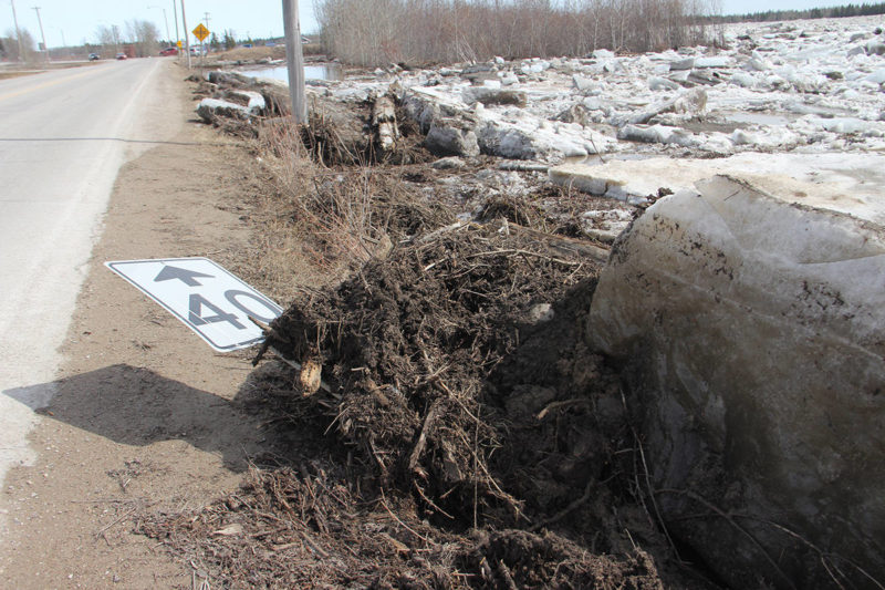                                             A speed limit sign fell victim to ice pushing up out of the Hay River on May 7, on the East Channel near Porritt Landing. Paul Bickford/NNSL photo                            