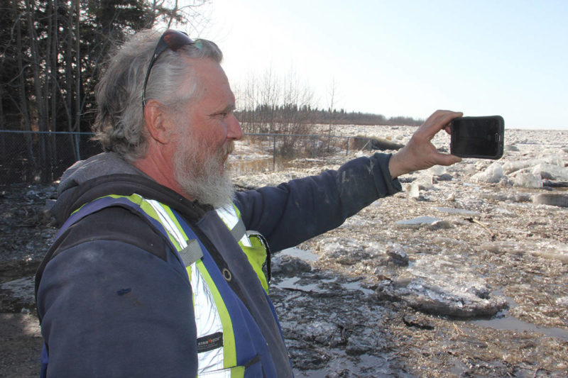                                             On May 6, area resident Pierre Lelaidier captures images of ice filling the West Channel of the Hay River. Paul Bickford/NNSL photo                            