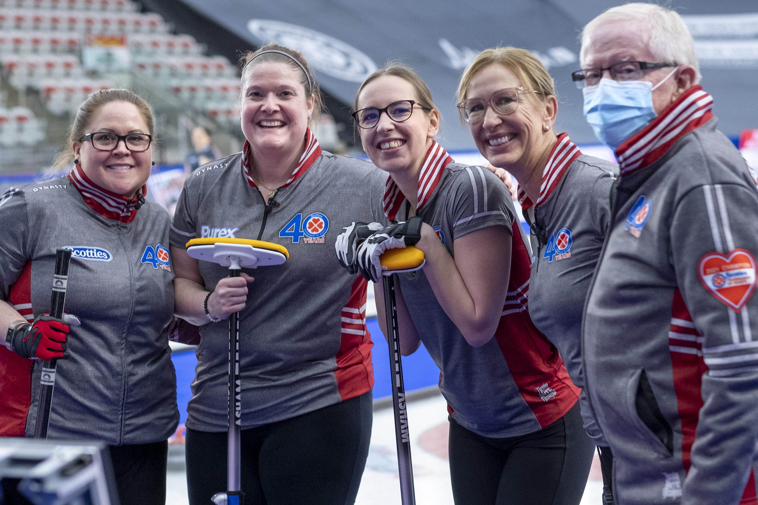Team NWT is all smiles following their 7-5 win over Ontario's Rachel Homan at the Scotties Tournament of Hearts in Calgary on Wednesday morning. From left, Kerry Galusha, Shona Barbour, Margot Flemming, Jo-Ann Rizzo and coach Jim Waite. Andrew Klaver/Curling Canada photo