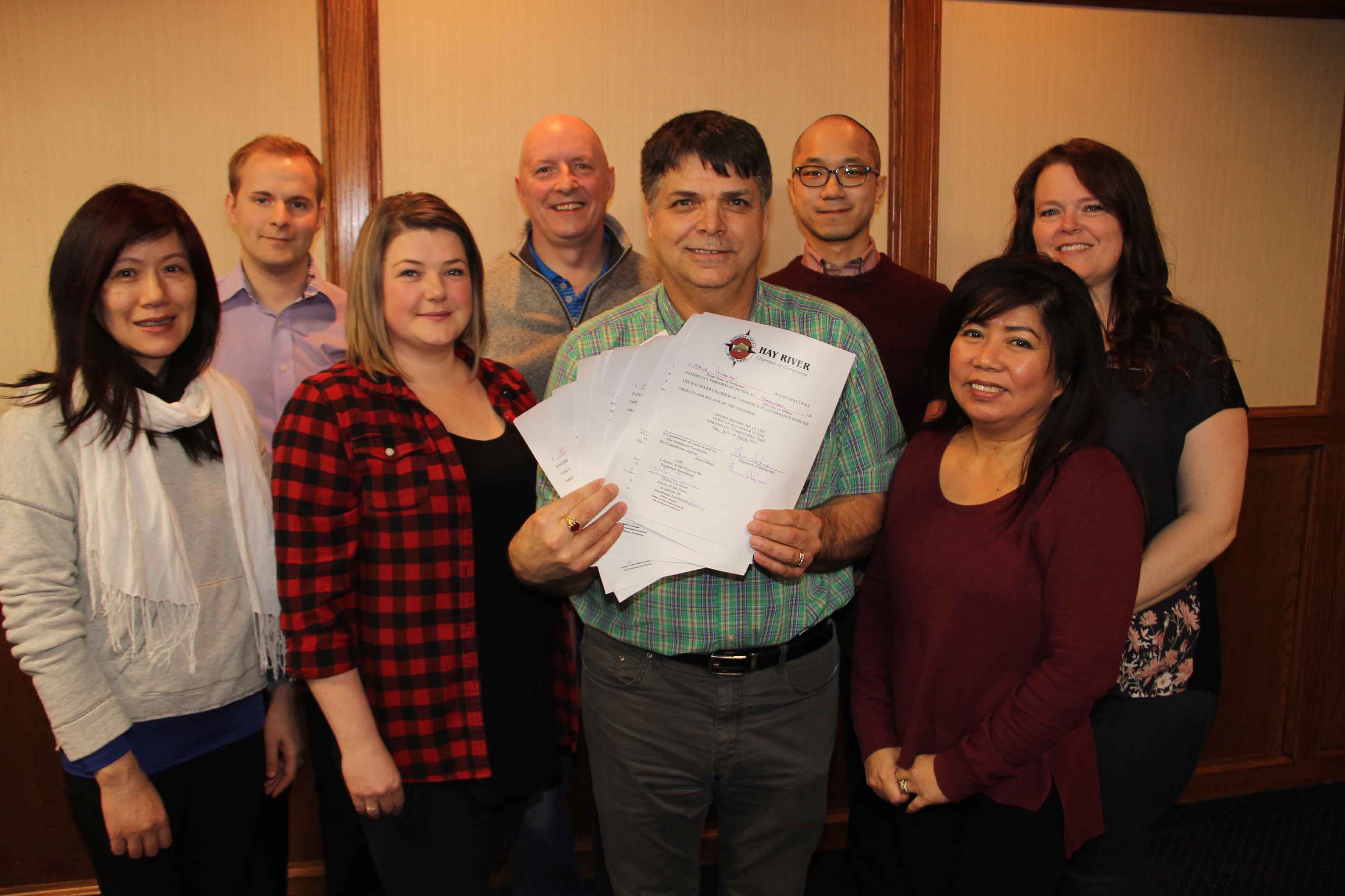 The new board of directors and executive of the Hay River Chamber of Commerce include, front row, left to right, director Eileen Teng Gross, director Jennifer Grandguillot, president Joe Melanson, holding the declarations of the new board members, and director Anna Crosman, and back row, left to right, first vice-president Terry Rowe, treasurer Steve Anderson, director Joey Jung and director Donna Lee Jungkind. Missing from photo are directors Jane Groenewegen, Leah McFarlane and Jerine George. Paul Bickford/NNSL photo