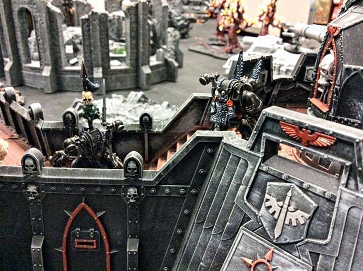 James Croizier shows off fully painted Warhammer 40k miniatures in action. It's one of several tabletop games he has at his downtown shop. Photo courtesy of James Croizier.