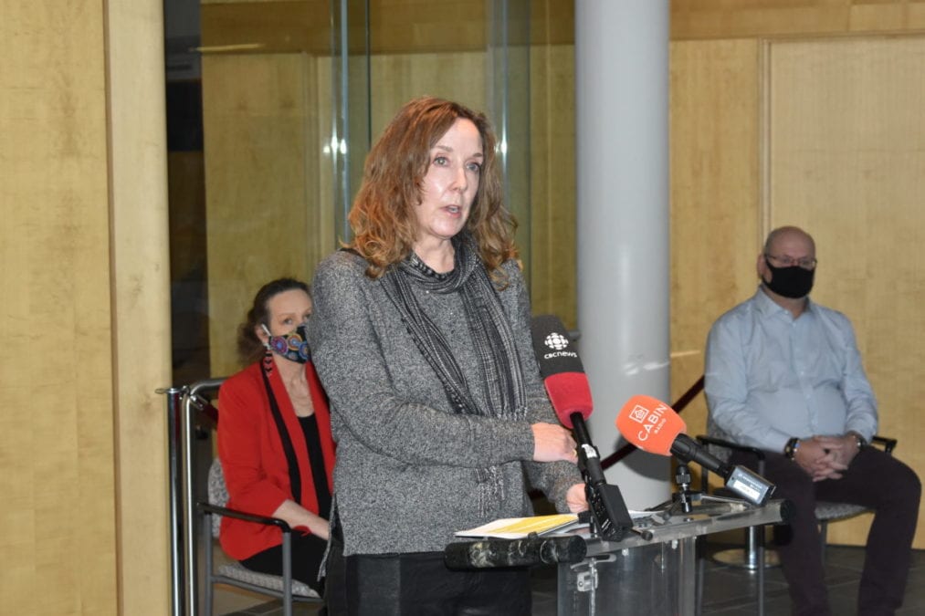 Territorial medical director Dr. AnneMarie Pegg speaks to reporters as Premier Caroline Cochrane and Environment and Natural Resources Minister Shane Thompson look on Jan. 17. The Covid-19 vaccination clinic scheduled for Thursday and Friday in Fort Liard will go ahead as planned despite the the recent Covid cases, Pegg said. Blair McBride/NNSL photo