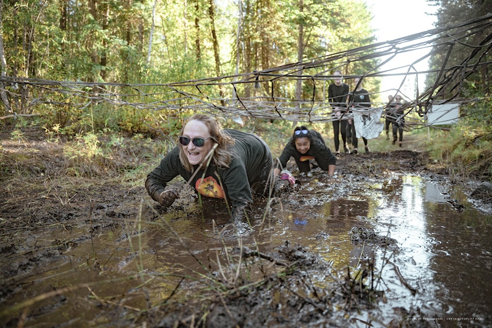 Jan Vallillee is all smiles during 2022's mud run.
