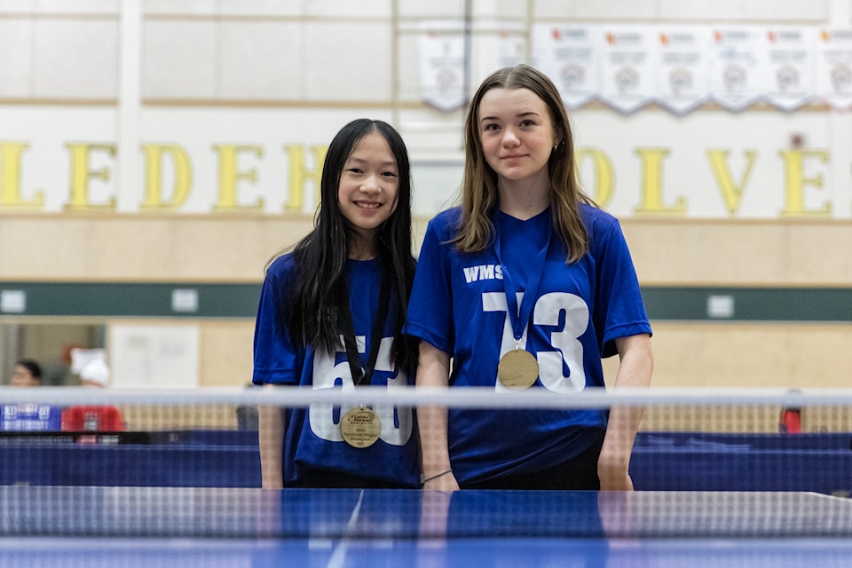 Kathleen Cai, left, and Emereigh Moffatt were the gold and silver medalists respectively in the Grade 8 girls division of the NWT School Table Tennis Championships. Photo courtesy of Thorsten Gohl