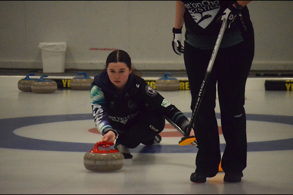 Sydney Galusha delivers one of her thirds' stones during play in the NWT Women's Curling Championship at the Yellowknife Curling Centre on Sunday. James McCarthy/NNSL photo