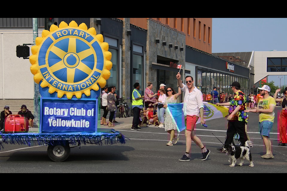 The Yellowknife Rotarians give a big wave during the Canada Day parade.