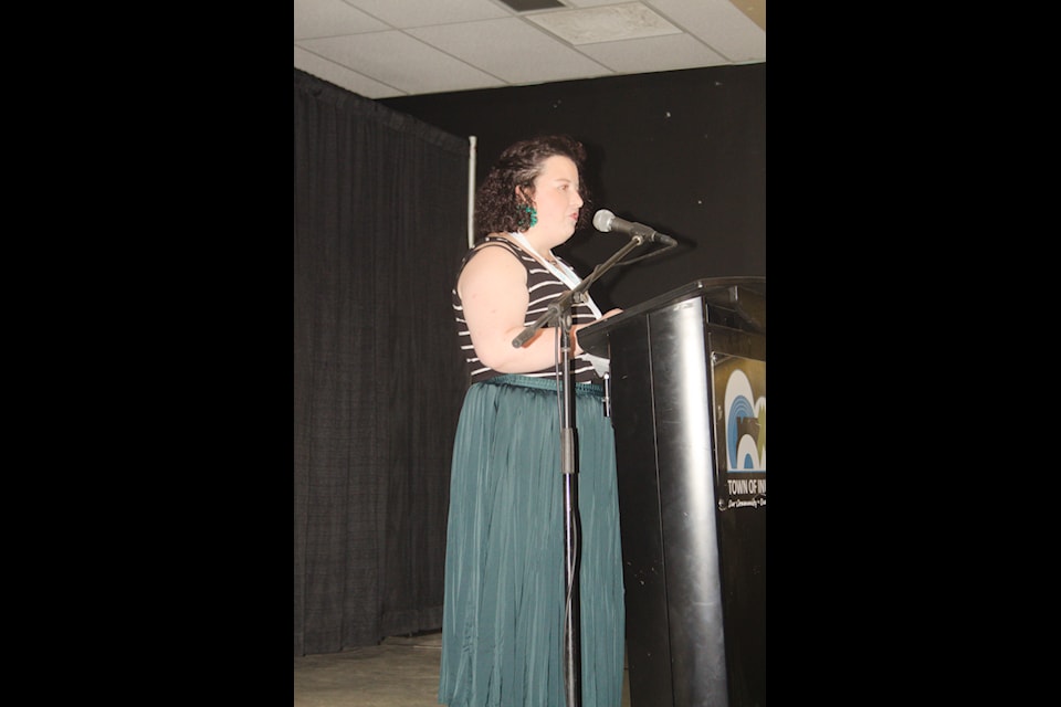 GNAF co-chair Luisa Juliana Ospina Suarez welcomes everyone to the party during the opening ceremonies.