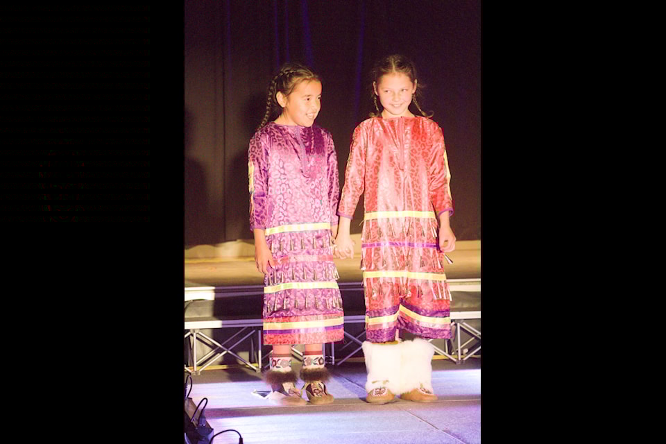 Our Youths of the Week are Kamyrn Mitchel and Gracie Adams, seen here having a laugh as they model traditional garb at the Great ϳԹ Arts Festival fashion show on July 12. Kamryn and Gracie were eager to show off a variety of traditional clothes for the appreciative crowd.