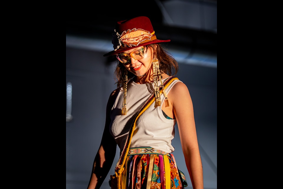 Alyssa Felix leads the show off with a contemporary design. Photo courtesy Eighty One Images