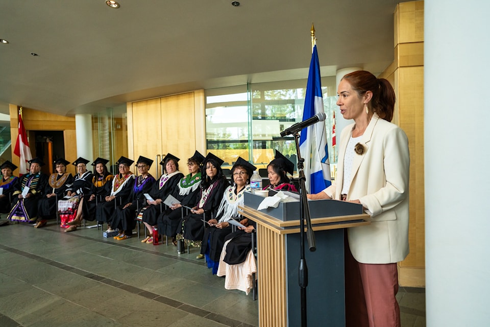 Deputy premier Caroline Wawzonek speaks on behalf of GNWT with graduates in the background during the Northern Indigenous Counselling graduation ceremony at the legislative assembly on July 5. Photo courtesy of Roy Erasmus Sr.