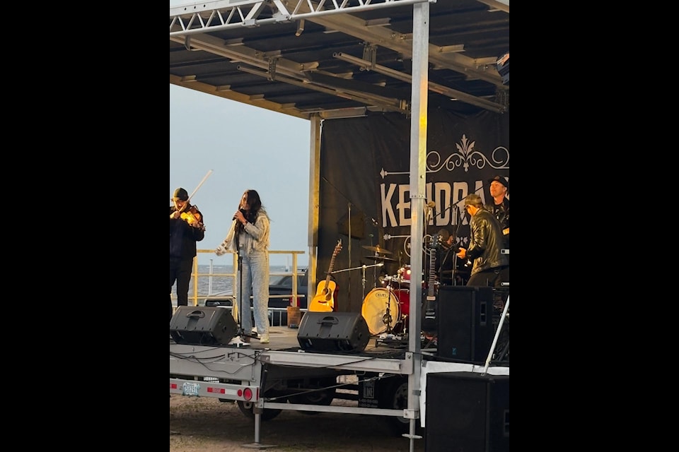 Singer Kendra Kay performs a song for the crowd. Joining her are Michael Audette on fiddle, Devin Biy on drums, Josh Gareau on bass and  Chad Greziuk on guitar.
Photo courtesy Chris Rayner