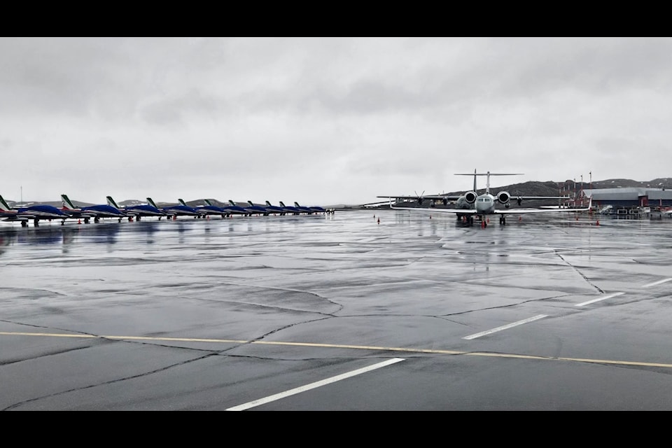 The team of eleven Aermacchi training and air show jets on the tarmac of Iqaluit Airport