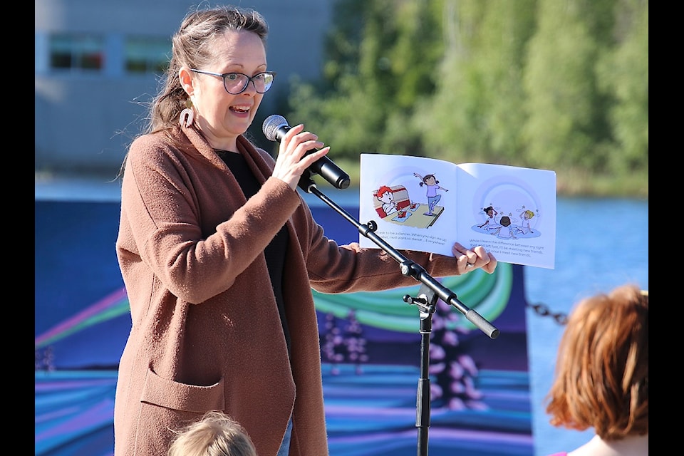 The joy of wanting and learning to dance in a beloved Christmas classic production is now the topic of a book commissioned by the Bella Dance Academy in Yellowknife for their 20th anniversary. The book, If You Take Me to The Nutcracker, was written by Yellowknife author Amber Henry and illustrated by John Henderson. Proceeds from the book will go to the Academy’s Scholarship Program.  In the photo, Amber Henry is shown doing a book reading at Somba K’e Park as part of a student appreciation event on Wednesday evening. Jill Westerman/ϳԹ photo